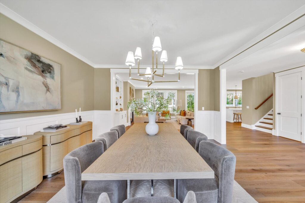 Dining room with wainscoting at 6 Willow Circle, Mashpee