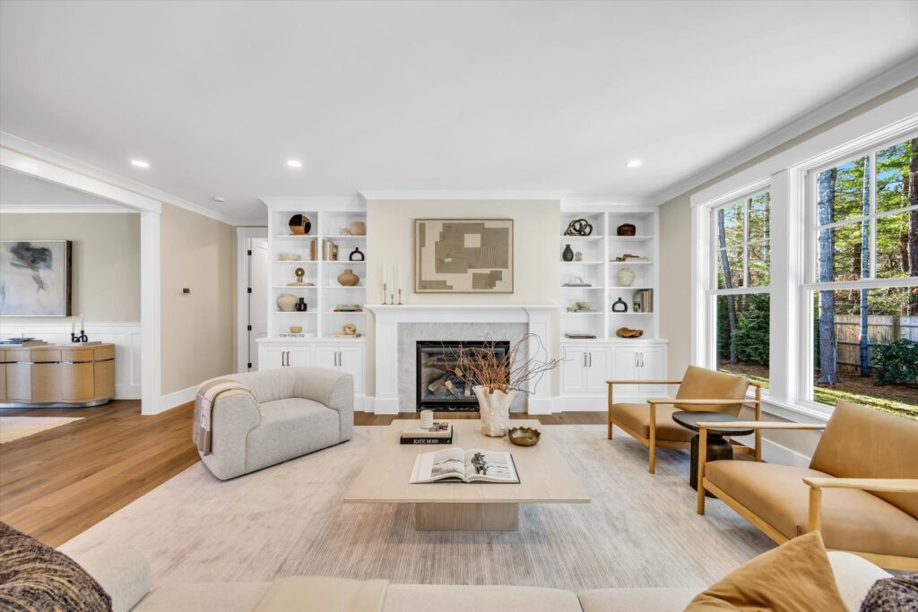 Living room with fireplace and built-ins at 6 Willow Circle, Mashpee