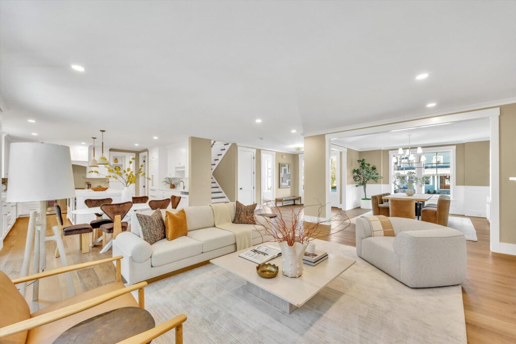 Open living area flowing to the kitchen and dining at 6 Willow Circle, Mashpee