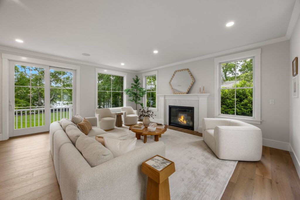 Living room with fireplace at 640 Poponessett Road